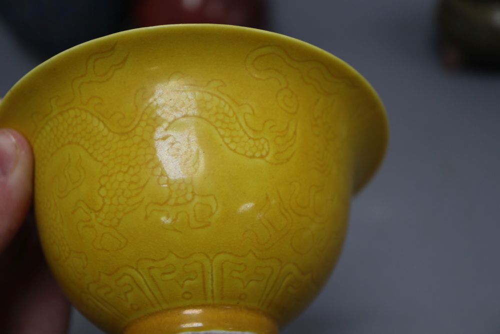 A Chinese Jun type jar, a similar censer, a hu vase and a yellow glazed bowl
